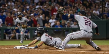 MLB's Top 5 Base Steals: Impact on Games (Last 3 Months) Baseball player sliding into second base, successfully stealing a base in a high-stakes MLB game.