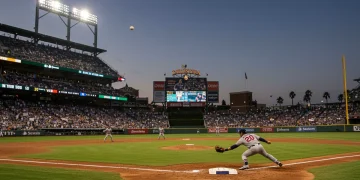 Defensive Dominance: 3 Elite MLB Fielders' Game-Saving Plays Elite MLB infielder making a diving stop during a game
