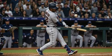 Dynamic baseball player hitting a home run in early 2025 MLB game