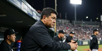 Baseball manager in dugout making game-changing decision