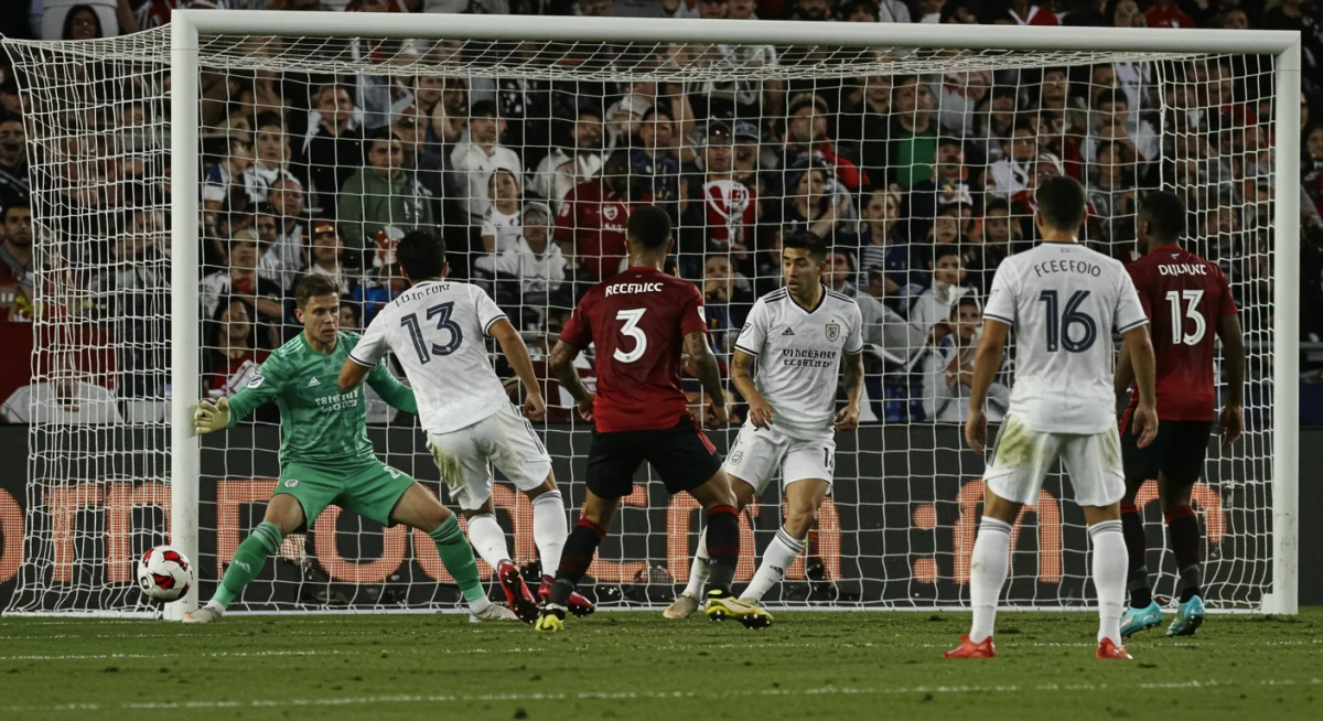 MLS player scoring a decisive goal in a competitive match
