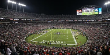 NFL Playoff Highlights 2025: Top 3 Predictions NFL playoff game under stadium lights with cheering fans