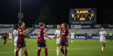 NWSL players celebrating a goal with a playoff-themed scoreboard in the background, symbolizing the intense 2025 NWSL Playoff Race.